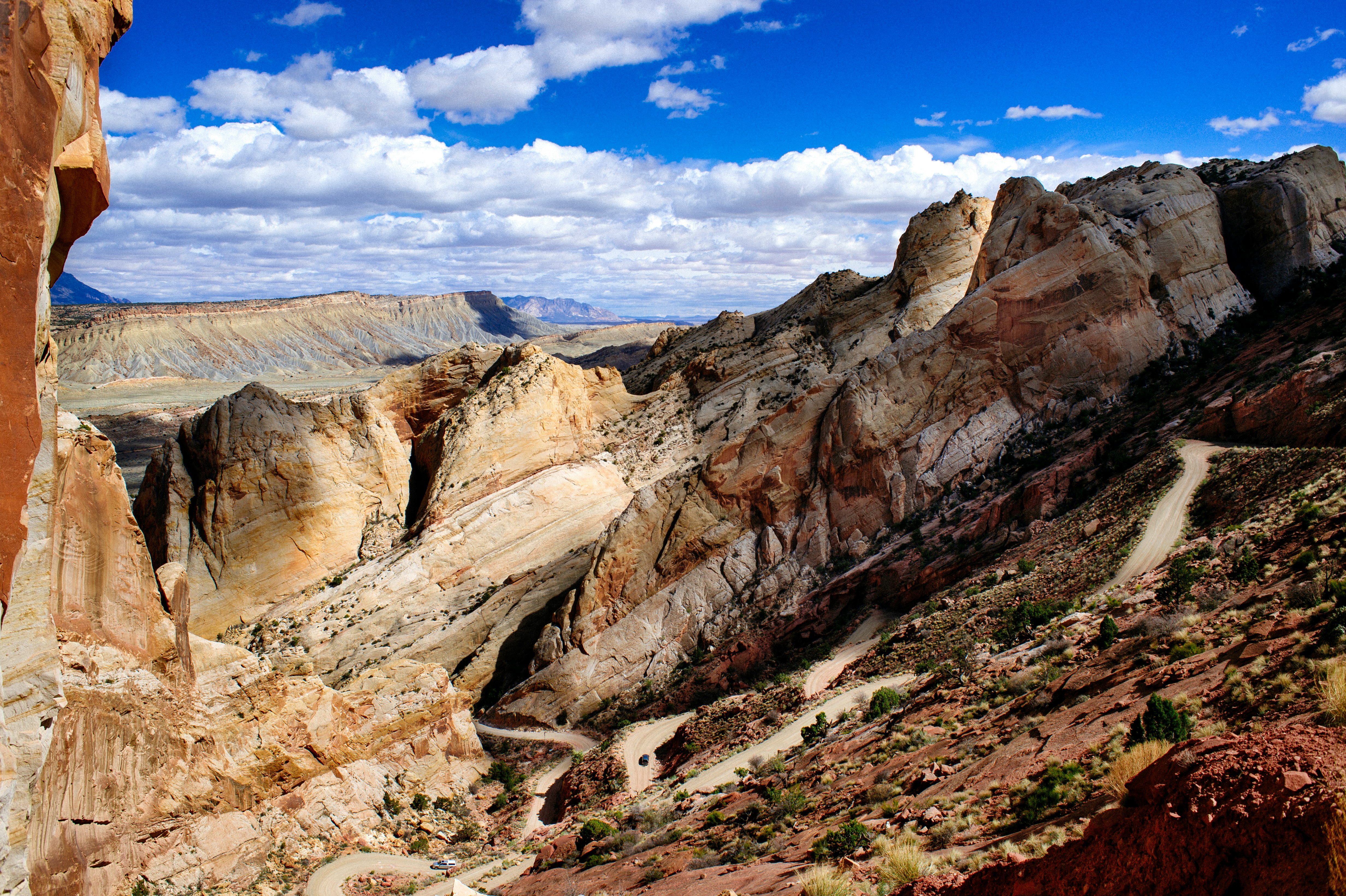 rocking mountain under blue and white sky